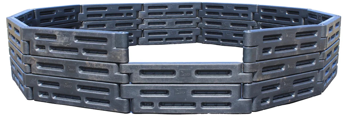 2by2 Industries in-ground high-wall gaga ball pit, three rows of black plastic border timbers with an entry cutout