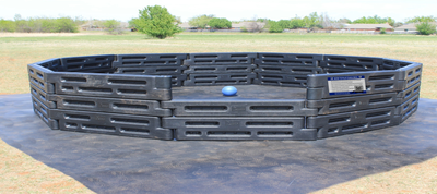 15 foot high-wall gaga ball pit with a How to Play sign beside the entry cutout