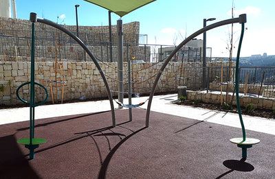 Psagot Playgrounds Carob Multi-Spinner - rope course connecting two spinners