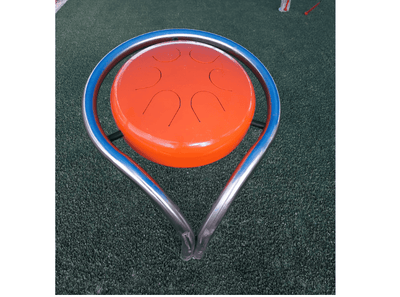 Psagot Playgrounds Melody Drum - steel tongue drum producing melodic tones outdoors