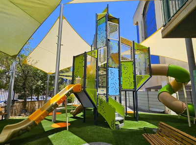 Psagot Playgrounds Nepal - Himalayan-inspired HPL play tower with climbing nets and slides