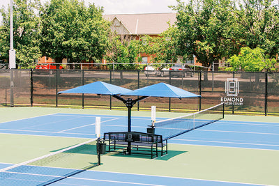 Superior Shade cantilever umbrella shades over a tennis court