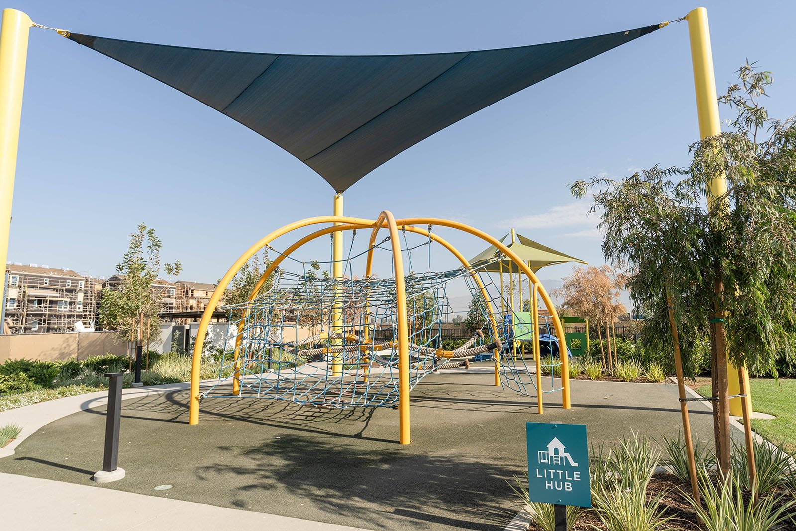 Superior Shade equilateral shade sail over a playground