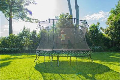 Springfree-8ft-x-13ft-Large-Oval-Trampoline-Front-W-Kid