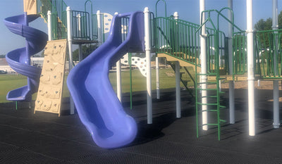 LMADRS rubber matting close-up showing texture under playground slides